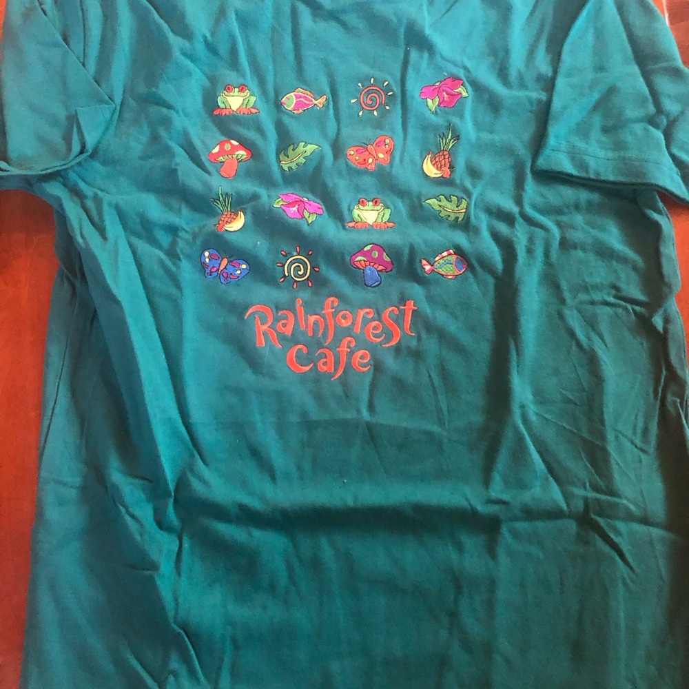 RAINFOREST CAFE Vtg. Teal Short Sleeve Graphic Tee with Colorful Nature Icons